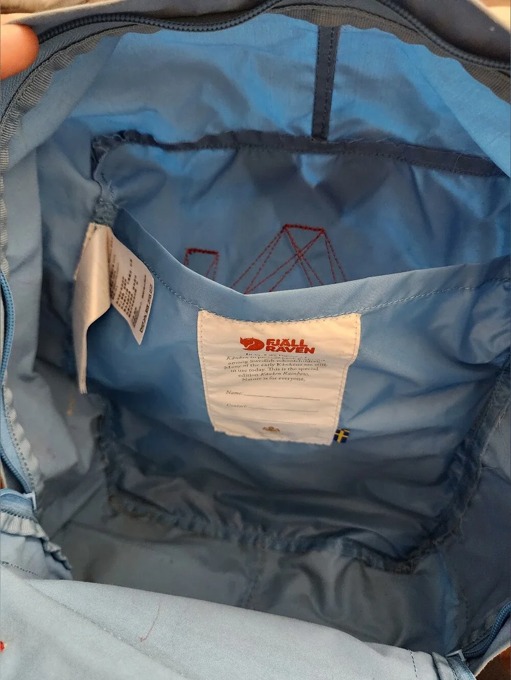 Classic Light Blue Backpack with Rainbow Accents
